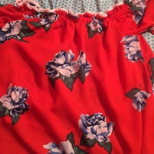 Beautiful crop top with blue flowers.